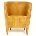 fotografia a colori della poltrona mod. Daniel struttura  in rattan, seduta e schienale in midollino intrecciato interamente a mano Cod. E-24 dell'azienda Italhome. (fonte: Italhome srl)