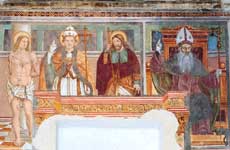 fotografia a colori del'affresco dei Santi mutilati dalla nicchia: da sin. Sebastiano, Fabiano, Rocco e Antonio abate (autore: Danilo Povinelli)