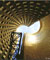 miniatura della fotografia a colori del interno del cone di una delle struture del Parco europeo di Vulcanismo (fonte: http://www.vulcania.com/anglais/index.php)